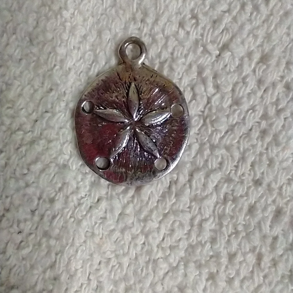 Silvertone sand dollar pendant